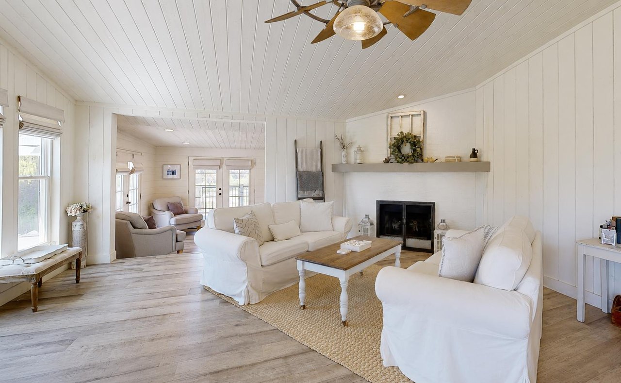 Warm, welcoming living room featuring a gas fireplace and inviting conversation area.