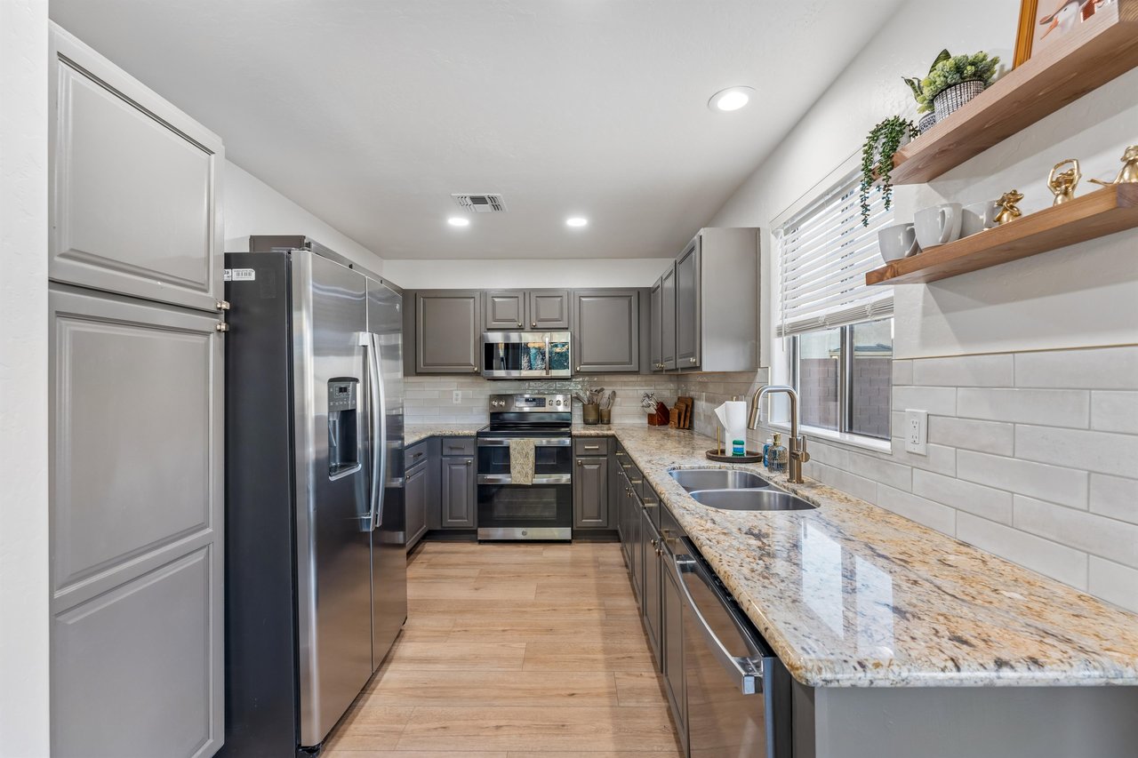 Stainless steel appliances and cooking essentials.