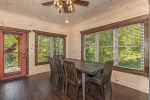 Dining table and chairs with window views