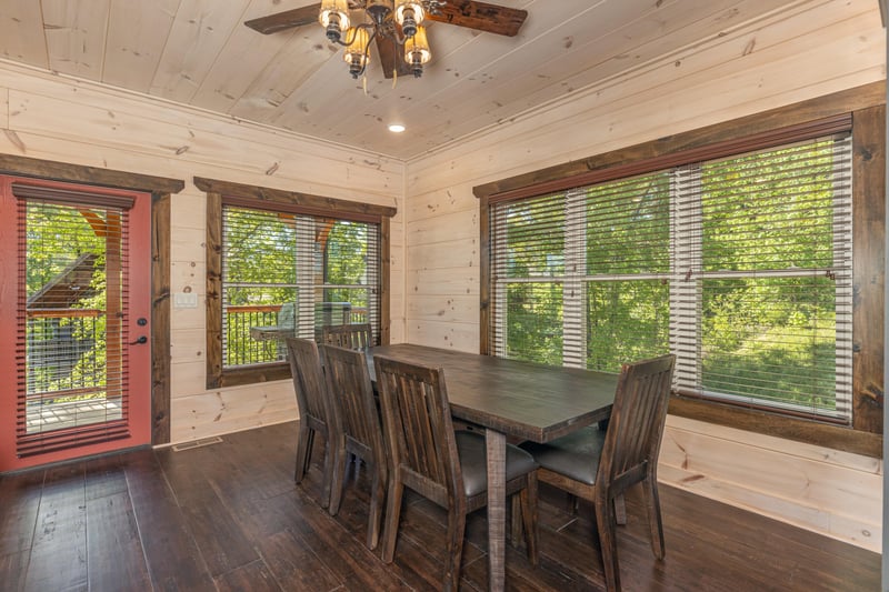 Dining table and chairs with window views