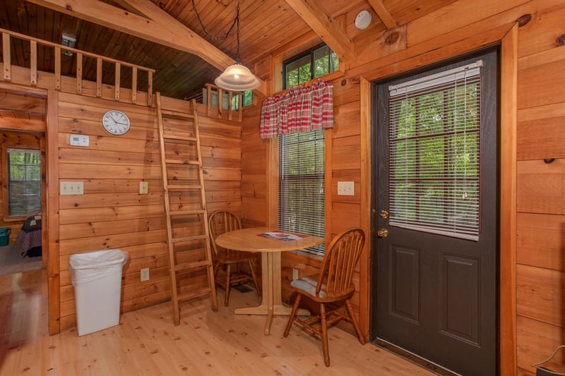 dining room for two with ladder to the loft angels dream a 1 bedroom cabin rental located in gatlinburg