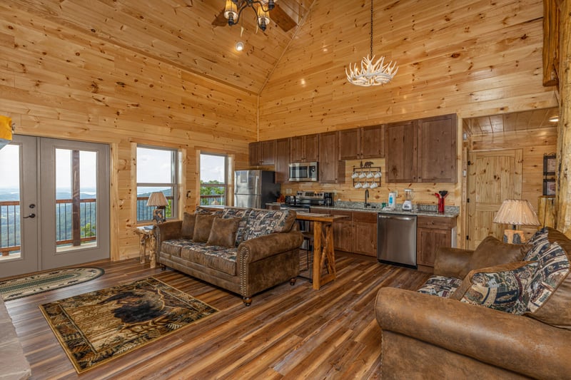Living room seating and full kitchen