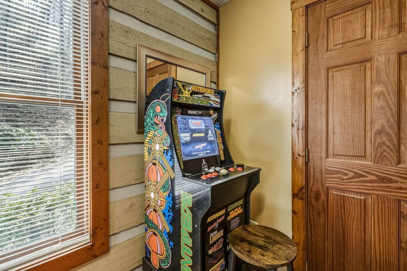 Challenge your friends to classic arcade games in your cozy game nook, where vintage nostalgia meets modern comfort.