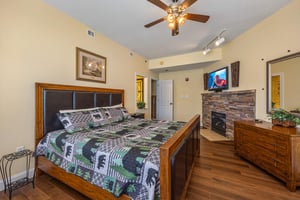 King bed at Heart of Gatlinburg, a 2 bedroom cabin rental located in Gatlinburg