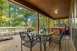 Deck with dining table and chairs