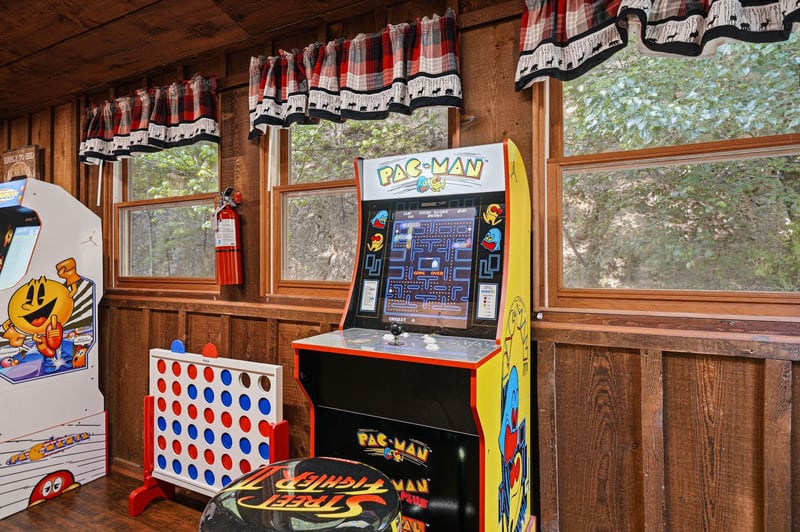 Step into your personal game room where PacMan arcade awaits alongside classic Connect Four for endless entertainment.