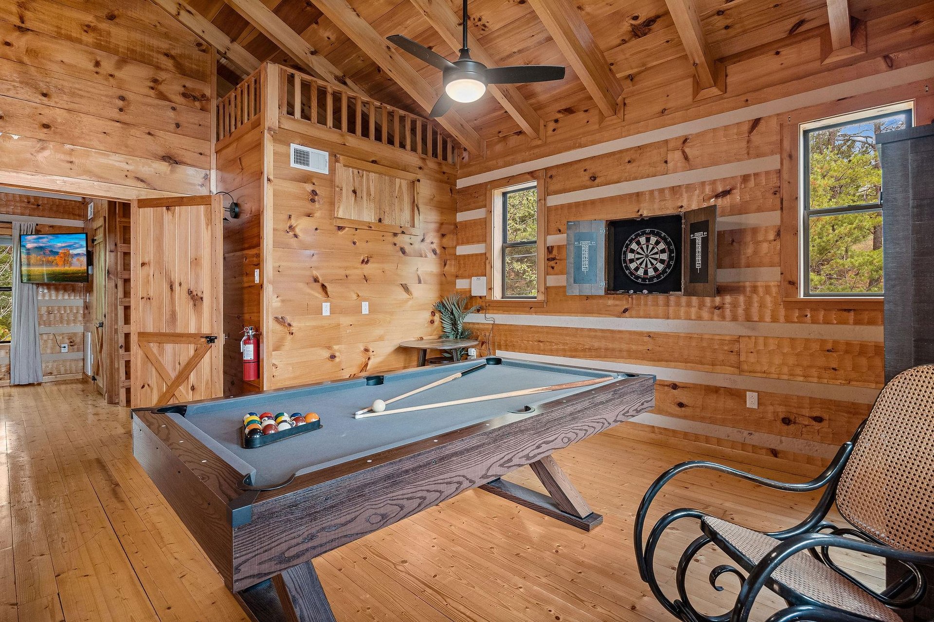 Pool table and throwing darts game