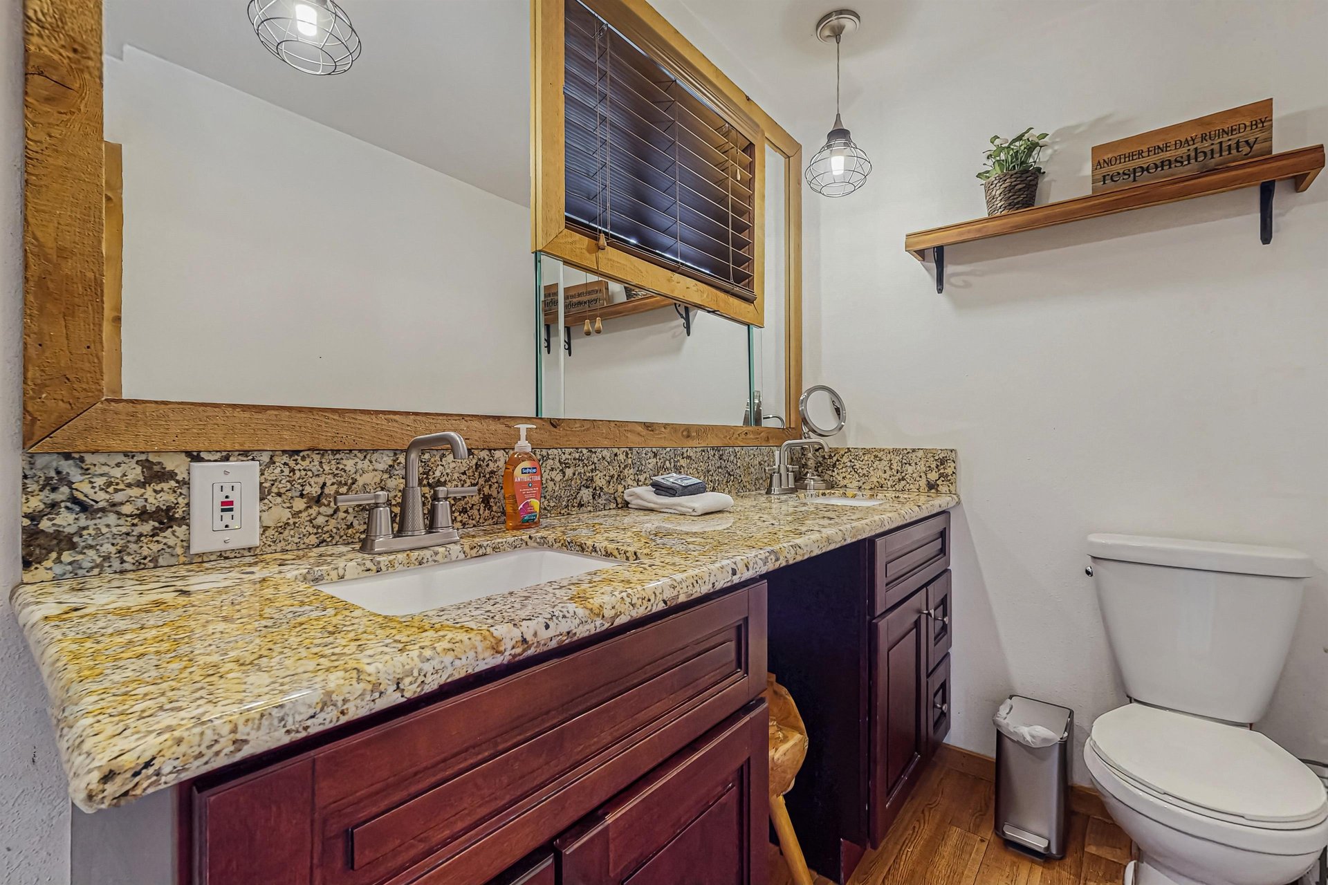 The primary bedrooms private en suite features a granite doublesink vanity and plenty of counter space to get ready for the day.