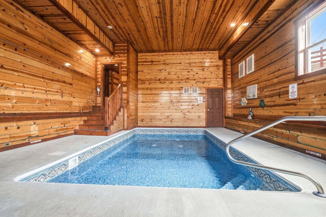Immerse yourself in your private indoor pool sanctuary, surrounded by warm cedar walls and sparkling blue waters perfect for yearround relaxation.