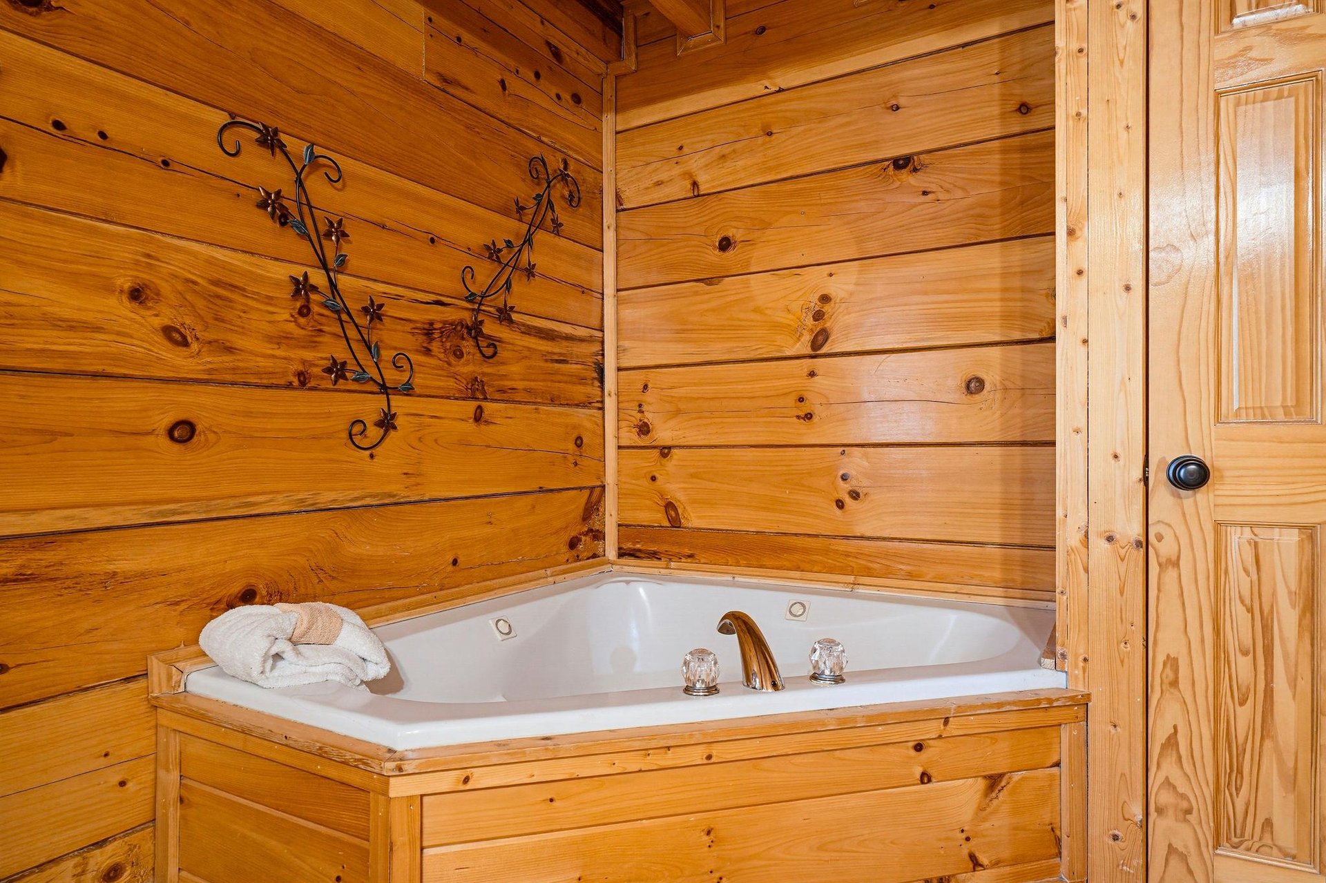 Slip into your private jetted tub, surrounded by warm knotted pine—this cozy corner is all yours for pure relaxation and unwinding after a day of adventure.