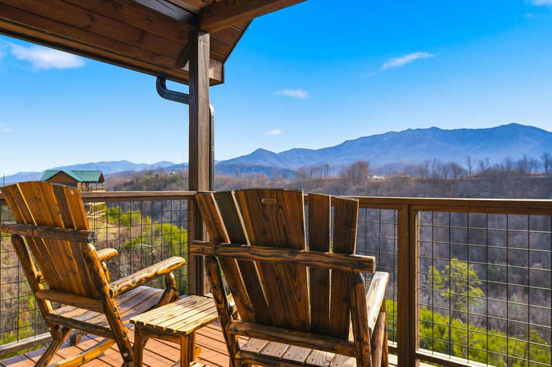 Sip your morning coffee in these handcrafted Adirondack chairs while soaking in breathtaking mountain views that stretch endlessly before you.