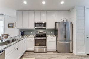 Large Kitchen With Stainless Steel Appliances
