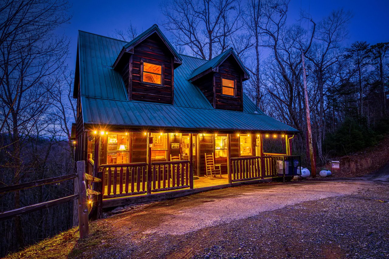 Moonshine Memories at night, a 2 bedroom cabin rental located in Gatlinburg
