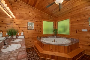 Jacuzzi tub, walk in shower and double sink vanity