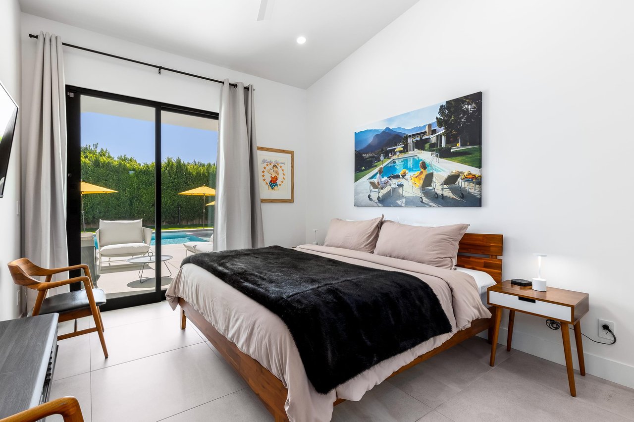 Easy patio access from this guest bedroom