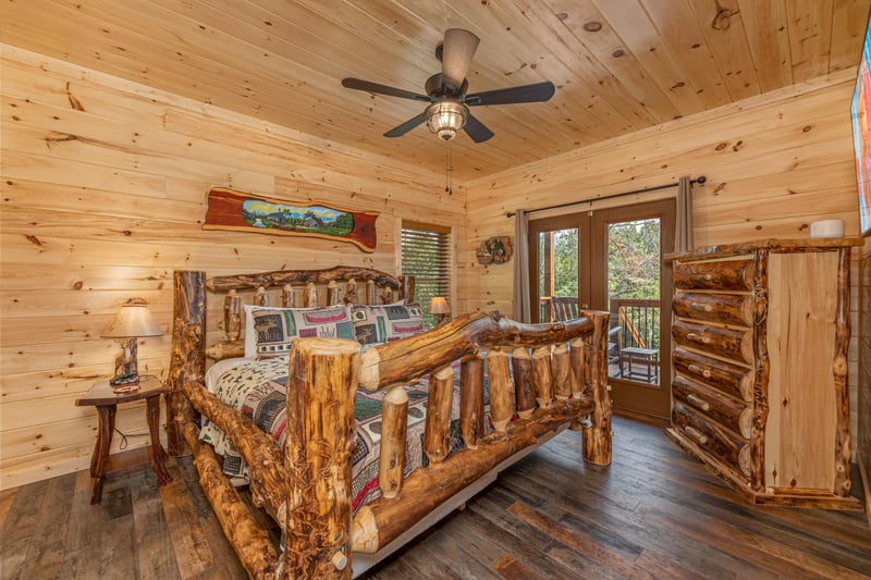 King size log bed with balcony