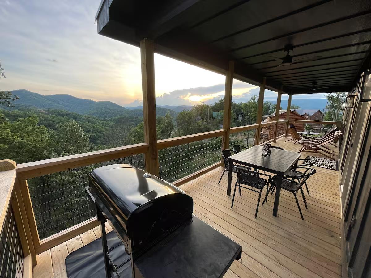 Deck grill and outdoor dining table and chairs