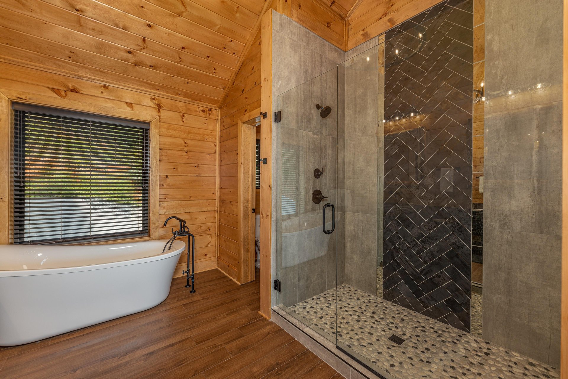 Bathroom with a soaker tub and walk in shower