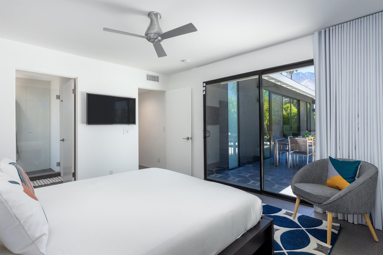 A gorgeous bedroom with outdoor access