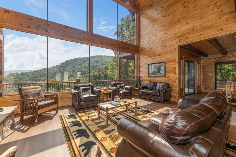 Living room with lots of seating and large windows