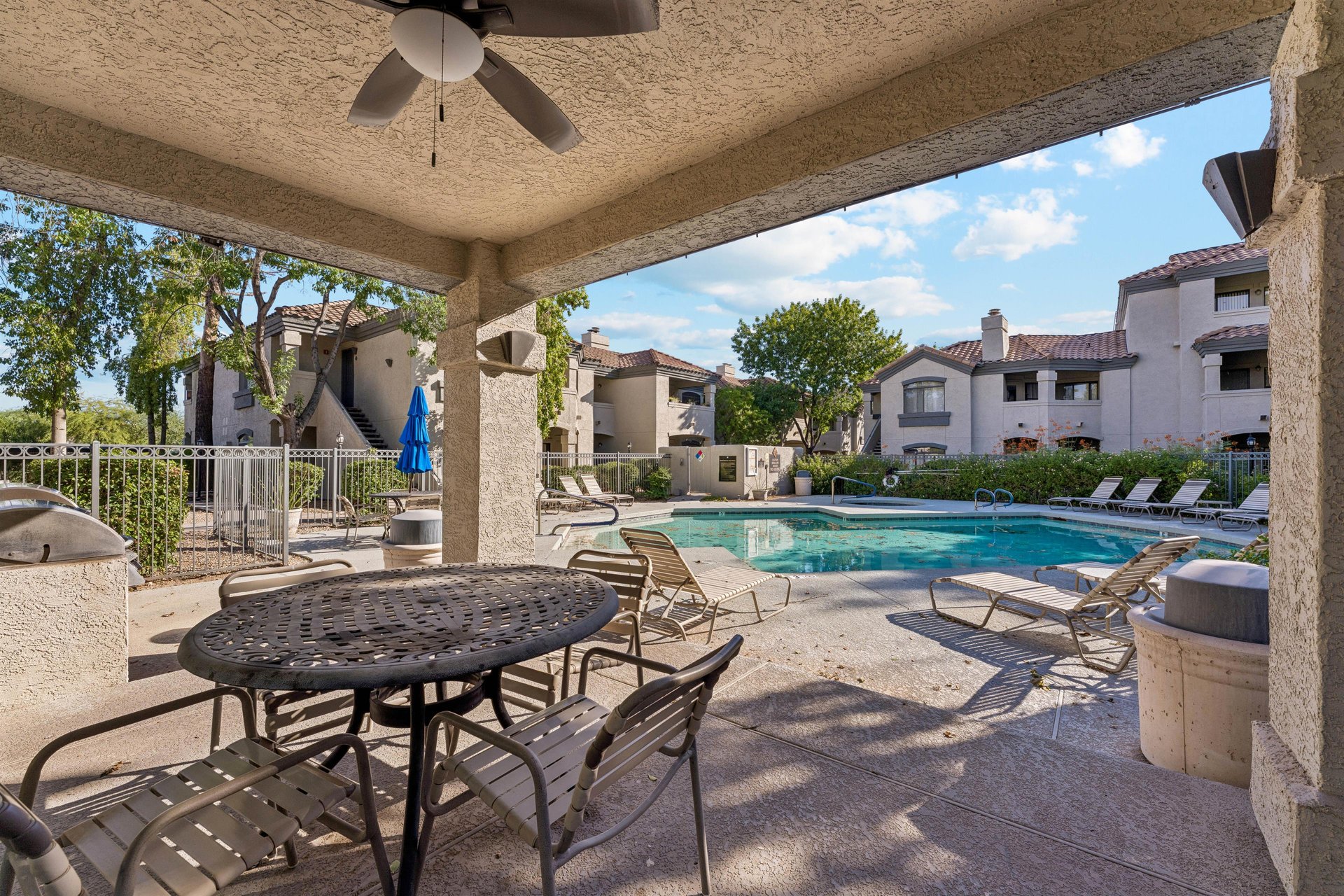 Shared outdoor dining space located near the shared poolspa.