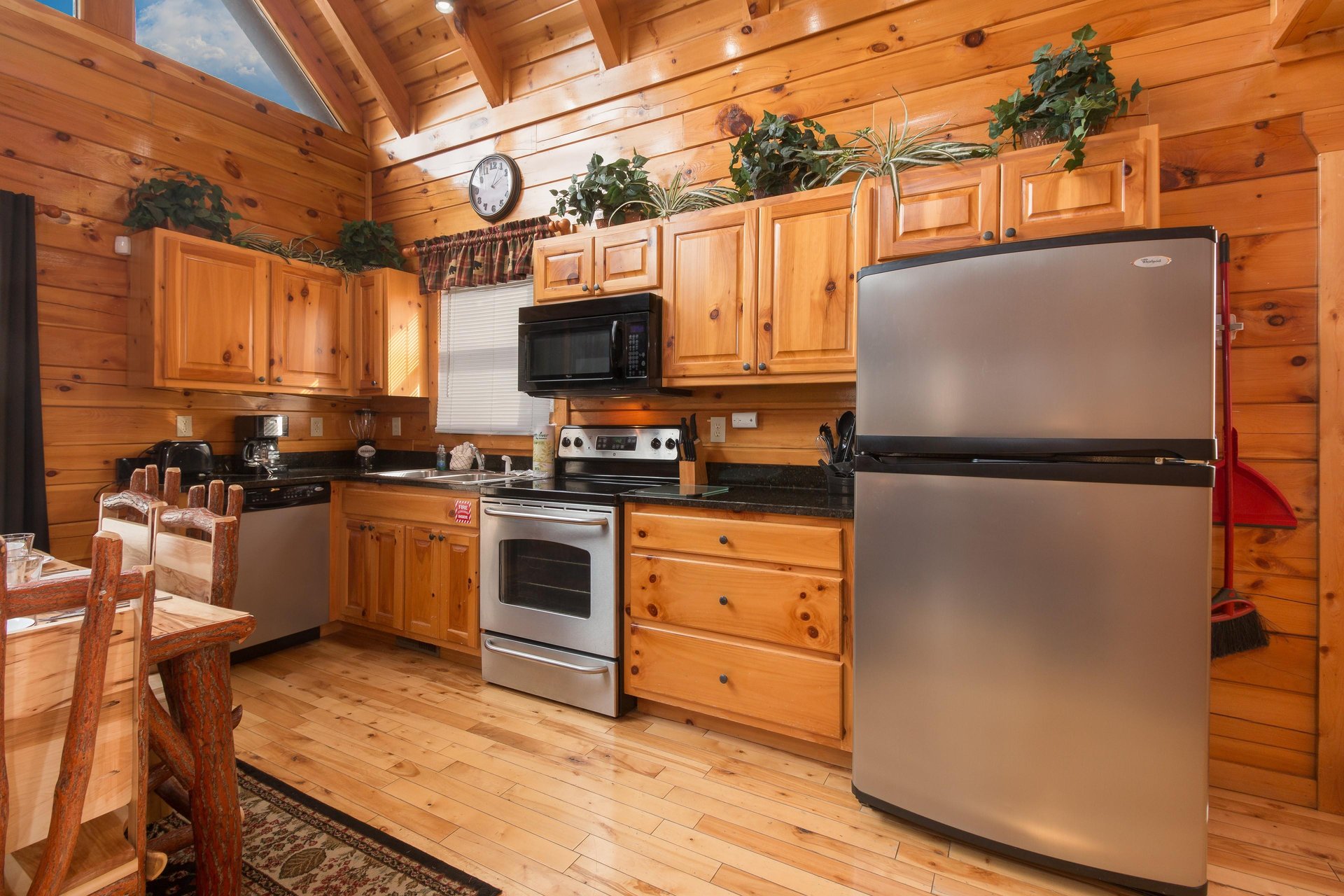 Kitchen with stainless appliances at Country Bears Getaway, a 3bedroom cabin rental located in Gatlinburg