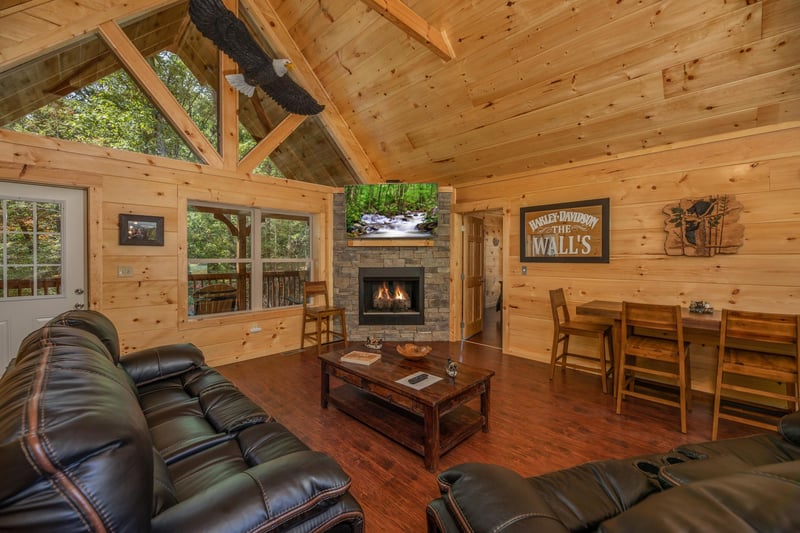 Living room with stone fireplace