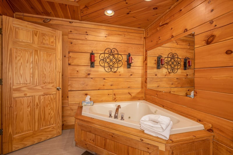 Jacuzzi in a corner at Livin Simple, a 2 bedroom cabin rental located in Pigeon Forge