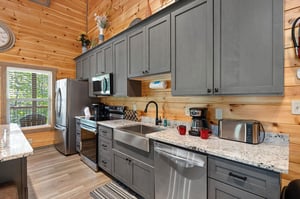 open concept kitchen with full size appliances