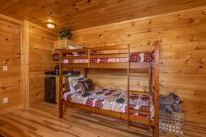 Bunk beds in the game room at Bears Dont Bluff, a 3 bedroom cabin rental located in Pigeon Forge