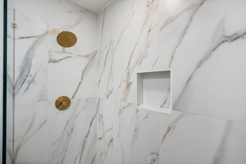 full bathroom with tile shower