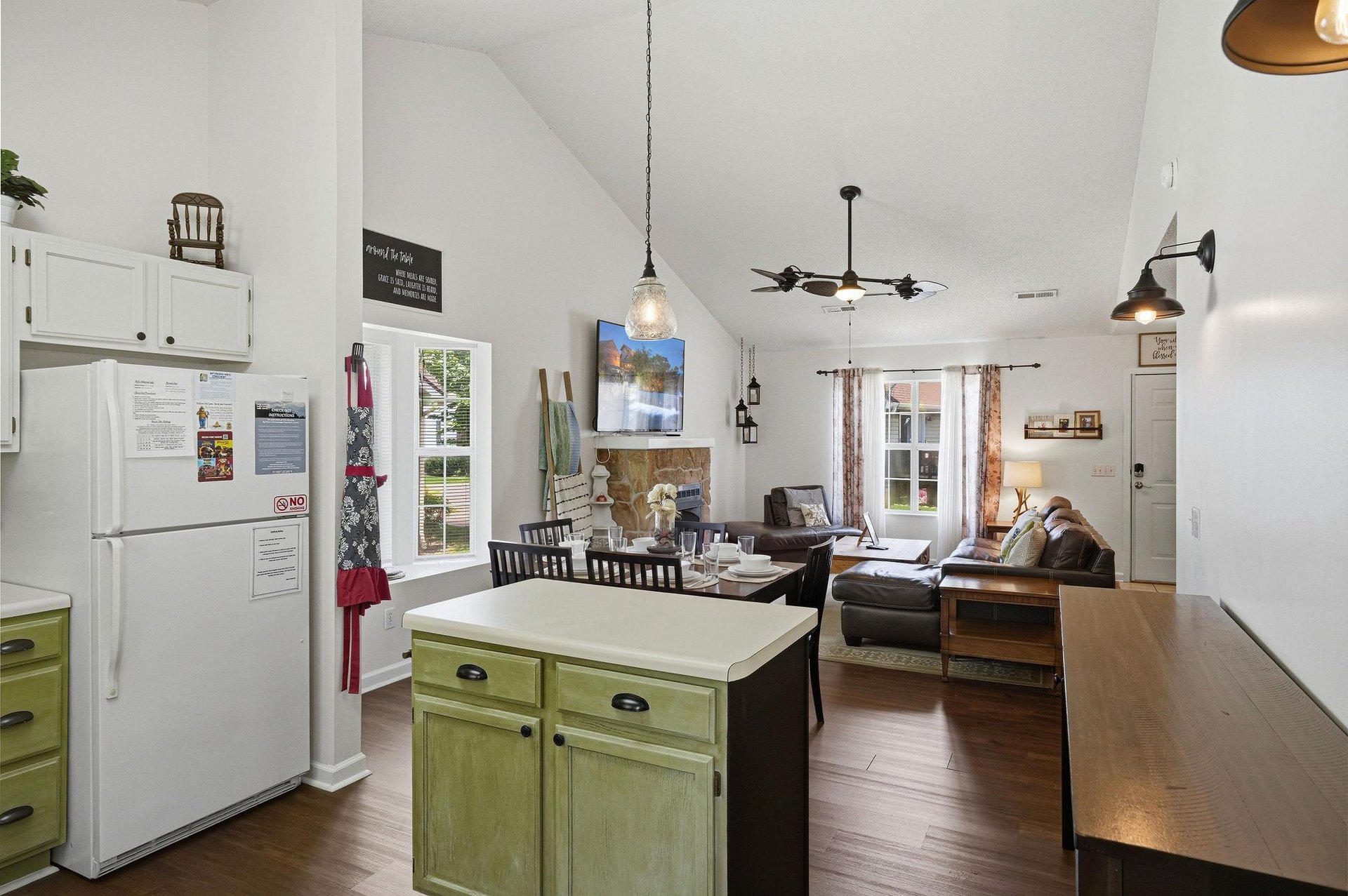 Relax in your openconcept living space with vaulted ceilings, cozy fireplace, and a fully equipped kitchen—perfect for gathering, cooking, and unwinding after a day of adventure.