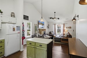 Relax in your openconcept living space with vaulted ceilings, cozy fireplace, and a fully equipped kitchen—perfect for gathering, cooking, and unwinding after a day of adventure.