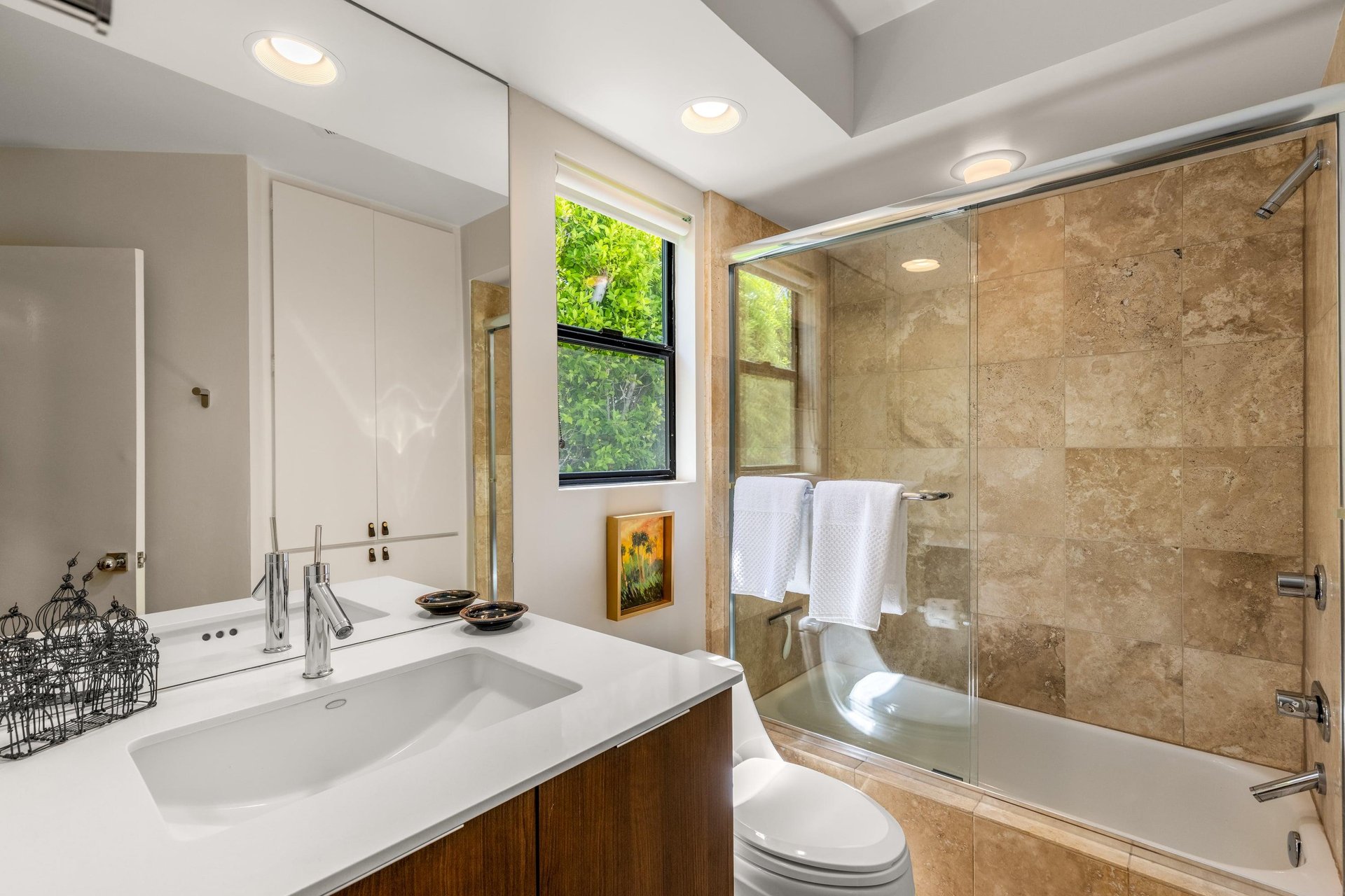 Ensuite bathroom with showertub combination.