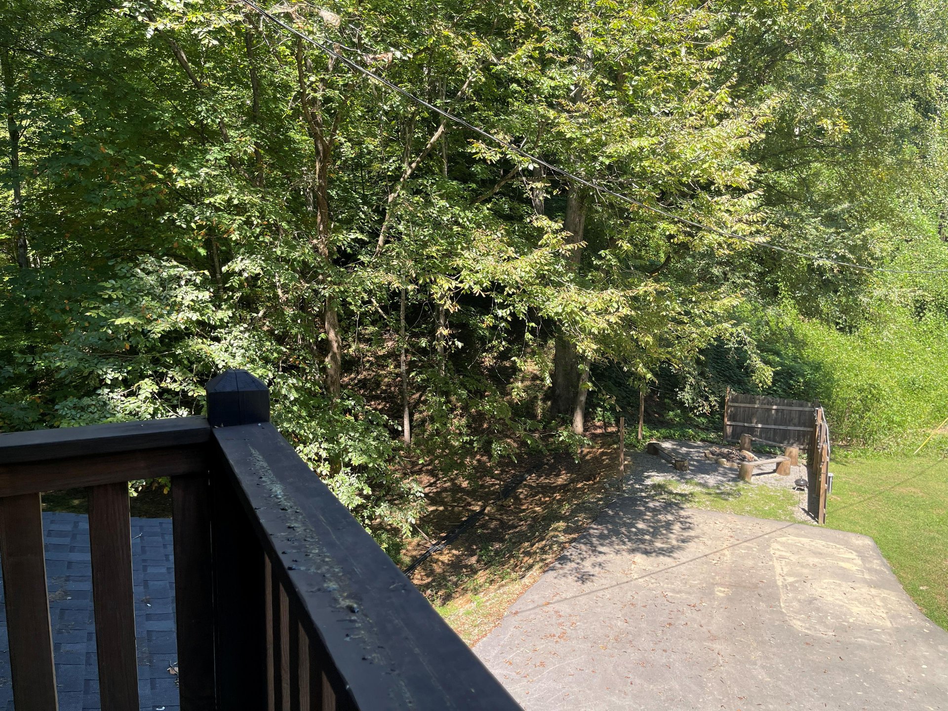 Step out onto the deck and take in the peaceful wooded surroundings, with a quiet path leading through the trees right from your doorstep.