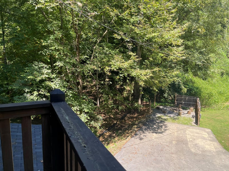 Step out onto the deck and take in the peaceful wooded surroundings, with a quiet path leading through the trees right from your doorstep.