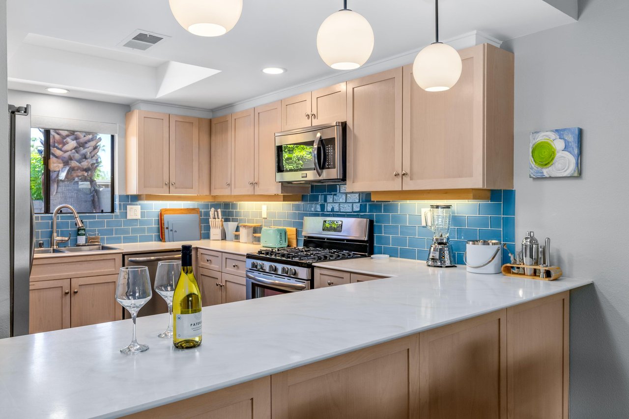 Stainless steel appliances, plenty of counter space, and cooking essentials.