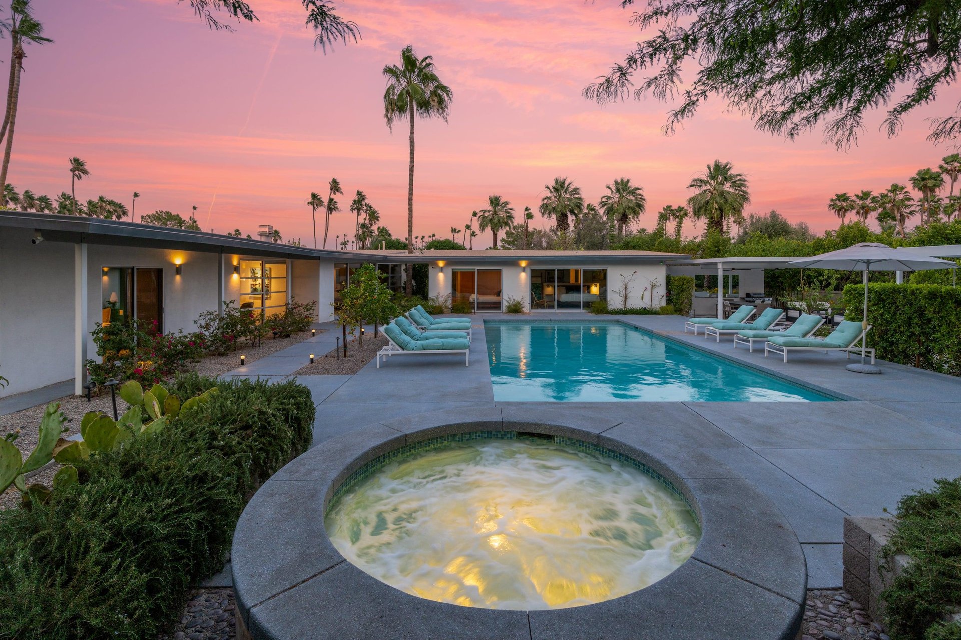 A luxury 4 bedroom and 4.5 bathroom home with a private pool, spa, outdoor dining, and chefs kitchen located in Indio, CA.
