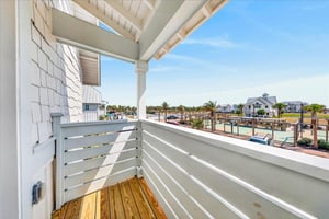 Balcony off secondary king suite.