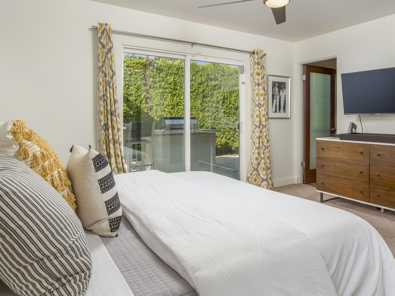 A gorgeous bedroom with outdoor access