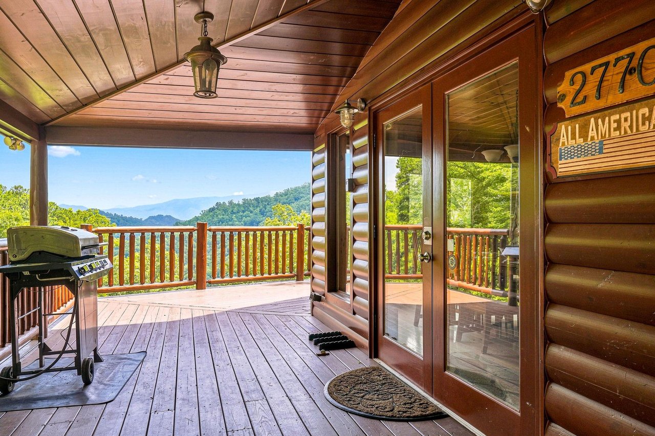 Step out onto your private covered deck with a gas grill ready for your outdoor cooking and stunning mountain vistas framing your peaceful retreat.