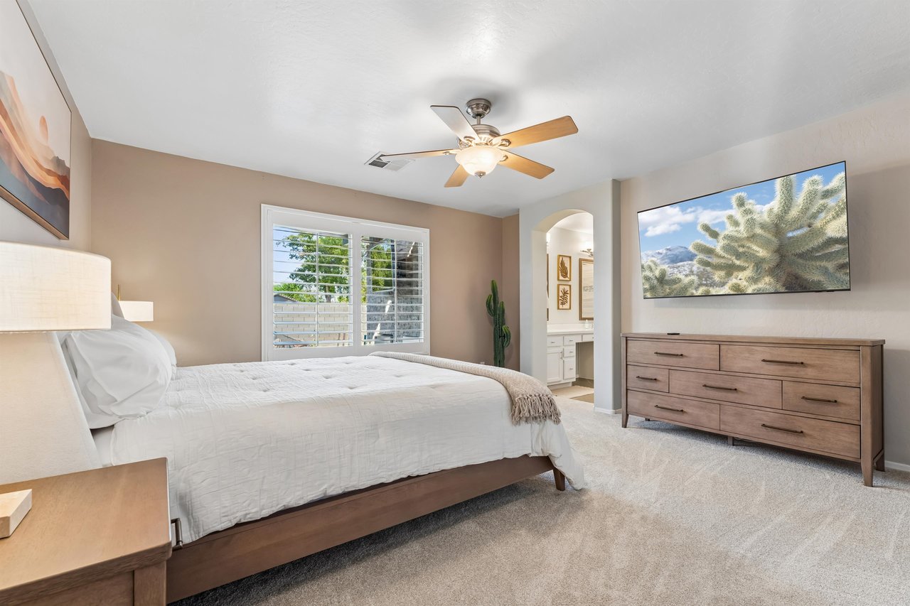King size bed, flatscreen TV, spacious closet, and ensuite bathroom.