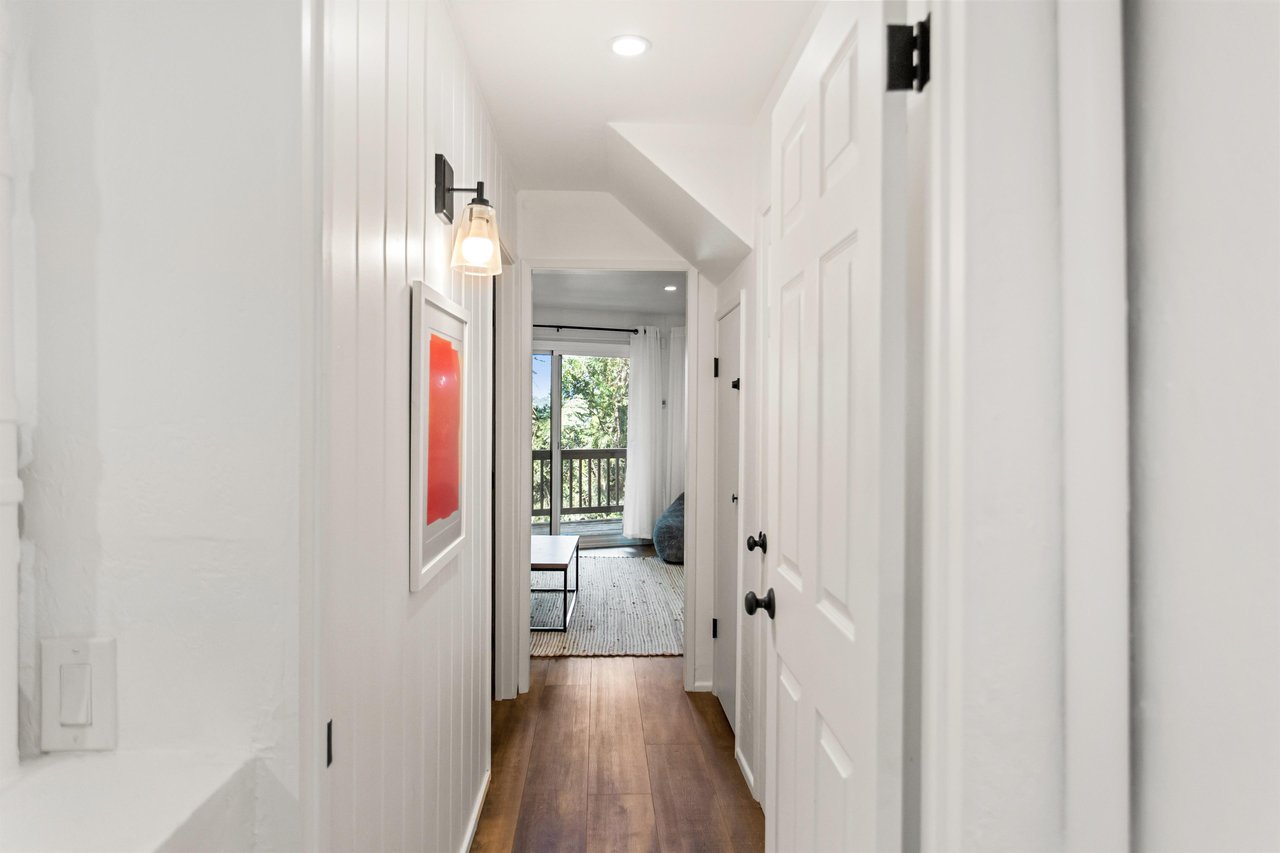 Hallway leading to one of the top floor bedrooms.