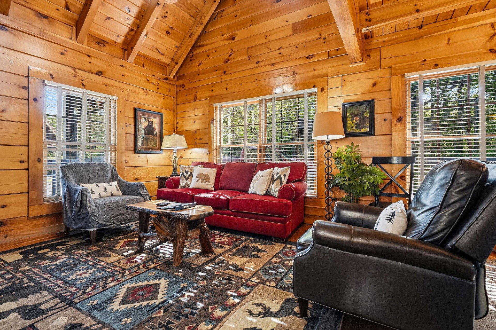 Sink into plush leather seating surrounded by warm wood beams and rustic charm in your cozy mountain retreat.