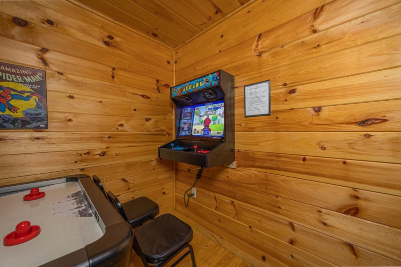 Arcade game at A Cheerful Heart, a 2 bedroom cabin rental located in Pigeon Forge