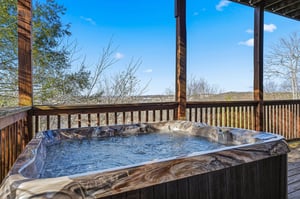 Soak in your private hot tub while taking in panoramic views of rolling hills and endless sky.