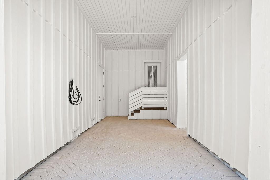 Carport With EV Charger  Exterior Shower Pathway