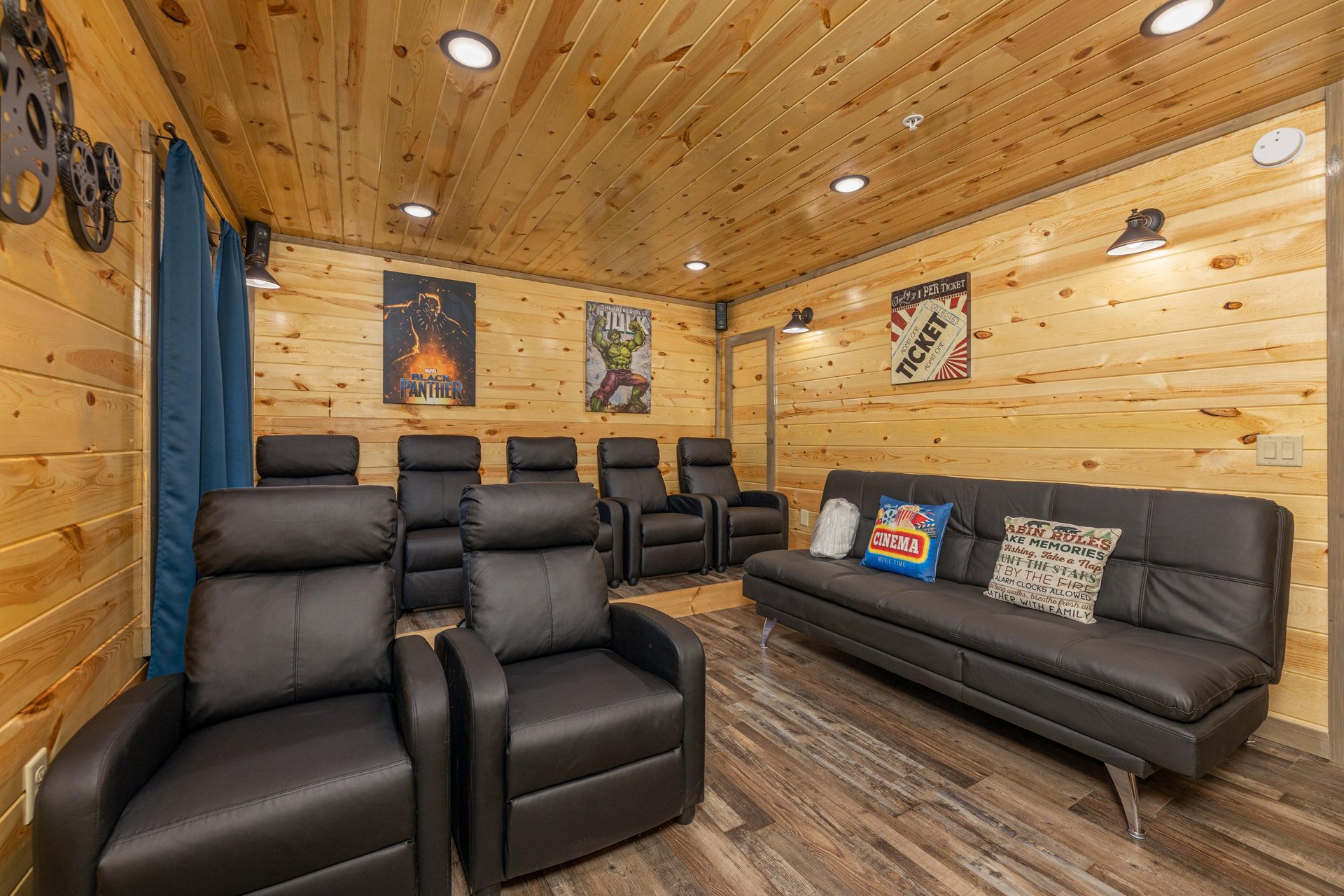 Seating in the home theater at Everlys Splash, a 4 bedroom cabin rental located in Pigeon Forge