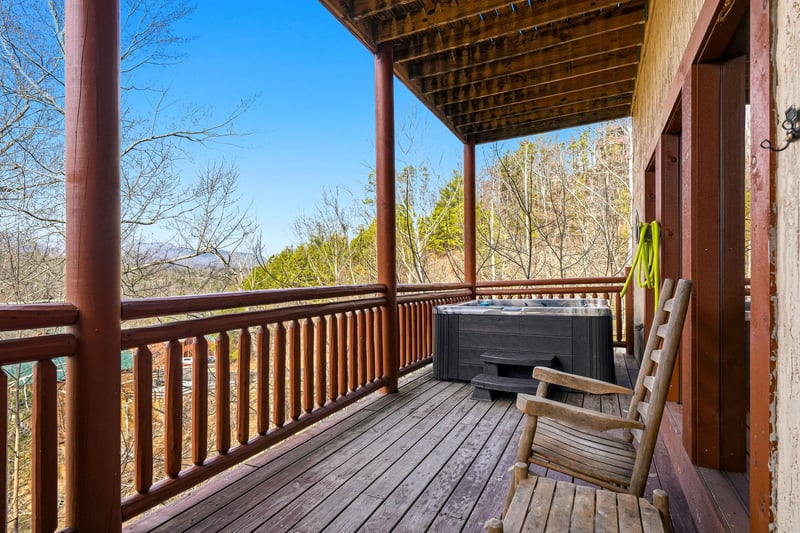 Unwind on your private deck with a bubbling hot tub and mountain views stretching to the horizon.