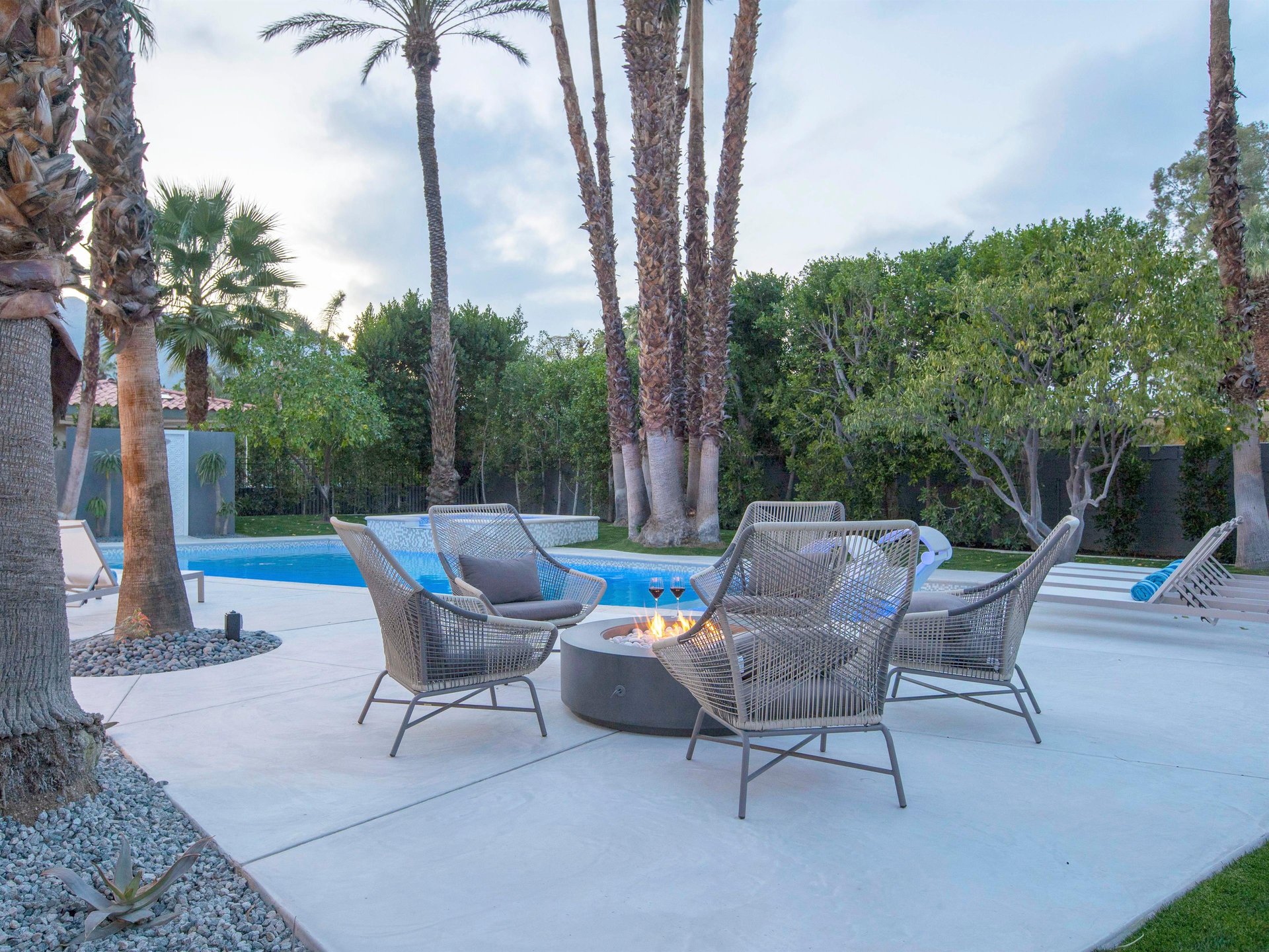 Comfortable seating around outdoor fire feature